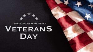 Image of American Flag, Veteran's Day. Honoring All Who Served.