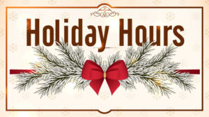 Garland with red bow, "Holiday Hours"
